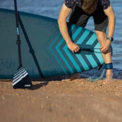 Gladiator Pro 10'6 X 32" Paddleboard 2023 -UK Surf Sales 2024 gladiator 10 6 on beach male model fin room fortext