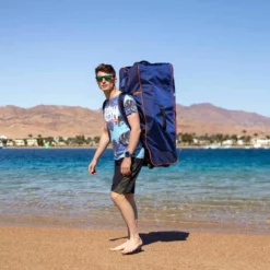 Gladiator Elite Race 12'6 X 26" Paddleboard 2023 -UK Surf Sales 2024 gladiator elite bag front with male model 9 1