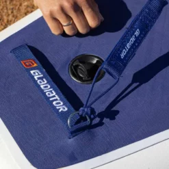 Gladiator Elite R Kids 10'6 X 24" Paddleboard 2023 21 Gladiator Elite R Kids 10'6 X 24" Paddleboard 2023 -UK Surf Sales 2024 gladiator elite putting leash on board 3 1