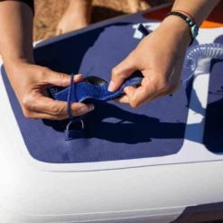 Gladiator Elite 11'6 X 34" Paddleboard 2023 -UK Surf Sales 2024 gladiator elite putting leash on board 1